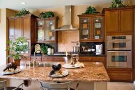 I was looking at your post on kitchen counter decorating and organizing and thought maybe you would have ideas or pictures of some decorating ideas for the tops of cabinets in the kitchen. Decorate The Tops Of Kitchen Cabinets 5 Innovative Ways Lovetoknow