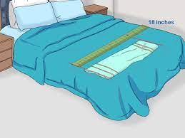 To put a fitted sheet on a bed by yourself. How To Make A Bed Neatly 11 Steps With Pictures Wikihow