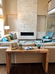 Craftsman home design chapel hill homes stanton design dilemmas how to design a great room fireplace wall. Two Story White Stacked Stone Fireplace