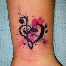 Bible verse musical heart tattoo. Musical Note Heart Watercolor Tattoo On Wrist