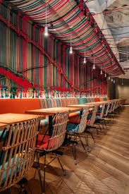 A Colorful Rope Mural Adds An Artistic Touch To This Restaurant Bar Design Restaurant Restaurant Design Restaurant Decor