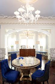 A Round Mirrored Table From Neirman Weeks Surrounded By Chairs From Baker Take Center Stage Elegant Living Room Design Eclectic Dining Room Parlour Design