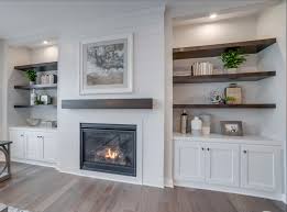 By the mid 1980's we had turned to subcontract work with major home builders, specializing in model home patio covers and production mailbox fabrication and installation. Hanson Builders Hillcrest Great Room Built In Shelves Living Room Living Room With Fireplace Living Room Built Ins