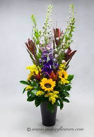 Check out flowerwyz for the best thanksgiving flowers, thanksgiving bouquets, table centerpieces for thanksgiving. Fall Thanksgiving Flowers Candle Centerpieces Vickies Flowers Brighton Co Florist