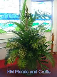Pin By Mario Yanos On Easter Pinterest Church Flowers Church Flower Arrangements Easter Floral Arrangement