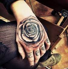 Unique Hand Tattoo Designs For Men And Woman Vogue Rose Hand Tattoo Rose Tattoos For Women Black Rose Tattoos