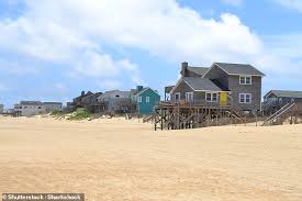 Holiday rentals in outer banks. Beach House Owners Sue The Outer Banks After They Are Blocked From Fleeing To Their Second Homes Daily Mail Online