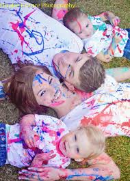 Family Paint Fight Minus The Paint I Kind Of Like This Idea Fun Family Photos Paint Fight Paint Photography