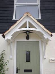 A porch (from old french porche, from latin porticus colonnade, from porta passage) is a room or gallery located in front of an entrance of a building. 16 Fearsome Canopy Nursery Ideas Cottage Front Doors Front Door Canopy Cottage Porch