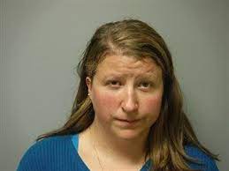 Woman charged with raping boy she babysat