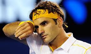 Australian Open 2011: Roger Federer gets past Gilles Simon in five sets