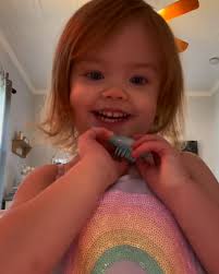 Little girl LOVES her reflection 🤩