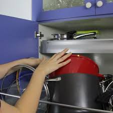 30 Storage Hacks That Will Instantly Declutter Your Kitchen Pot Lid Organization Pan Storage Diy Lid Organizer