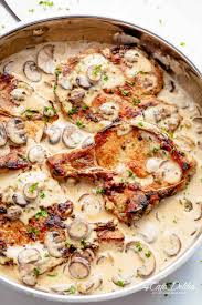 After the pork chops have baked for an hour, cover them with the soup. Pork Chops With Creamy Mushroom Sauce Cafe Delites