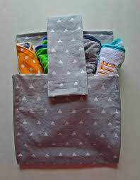 baby bib organizer hanging nursery storage baby caddy high etsy baby bibs kids storage stroller bag