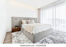 Bedroom color scheme ideas will help you to add harmonious shades to simple bedroom luxurious bedrooms small master bedroom master bedroom design grey bedroom. Simple Bedroom Interior Design Grey White Stock Photo Edit Now 1132449236