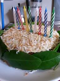 Birthday cakes are often layer cakes with frosting served with small lit candles on top representing the celebrant's age. Buttermilk Birthday Cake Test Run Domestic Scene