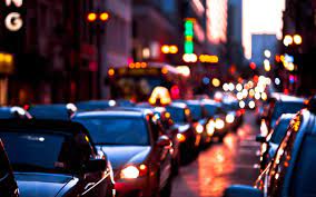 City lights at night wallpaper, man standing on city light, artwork. Wallpaper Street Night Car Road Photography Evening Traffic Bokeh Buses Head Lights Banner Light Crowd 1440x900 Px 1440x900 547767 Hd Wallpapers Wallhere