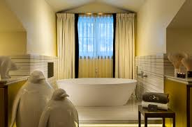 While travelers often choose a hotel based on five star dining luxurious spas convenient locations or even dreamy beds the hotel bathroom is one amenity that is often overlooked. Boutique Hotel Bathroom Design Concept Design