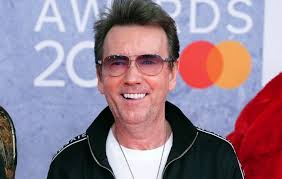 Tributes paid as Nightcrawlers songwriter and DJ John Reid dies "suddenly",  age 61