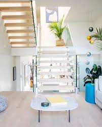 Modern curved staircases give a unique touch of class to any interior design, being this a private house or a commercial place. Split Level Urban House Regeneration Design Studio Archello