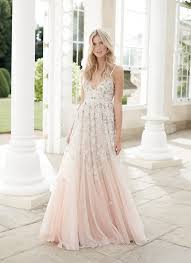 A simple hairstyle and natural makeup accompany the dress beautifully for a traditional look. 20 Simple Yet Beautiful Wedding Dresses For Modern Brides This Spring Praise Wedding
