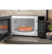 If you want to activate or deactivate the child lock function, press the kitchen timer button for 3 seconds. Ge Jes1145dmbb Ge 1 1 Cu Ft Capacity Countertop Microwave Oven Jes1145dmbb Art Handler S Appliance Center
