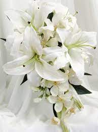 Beautiful cascading bridal bouquet made of pink oriental lillies, white singapore orchids and the purple and blue orchids. Pin By Alina Pochtovaya On Mom You Were On My Account Again Lily Bouquet Wedding White Lily Bouquet White Orchid Bouquet