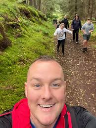 Forres Area Soccer Sevens sponsored walk over the Dava Way finishes with  barbecue at Grant Park pavilion