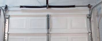 garage door torsion spring repair breaks