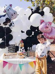The colorful tableware features cheerful animals, and it can be personalized with the guest of honor's photo. Modern Farm Birthday Party Momo Party