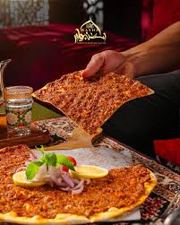 Lahmacun the Turkish flatbread you can't resist 🫓 Freshly baked and  generously topped with spiced lamb, herbs, and tangy garnish. 🍕 A true  Turkish classic at Basha Istanbul. #turkishfood UAN 051-111-222-225  www.bashaistanbul.com