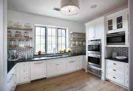 • traditional paneled cabinets give your kitchen a tailored look • cabinets ship next day. Stainless Steel Floating Kitchen Shelves With Black And White Backsplash Tiles Transitional Kitchen