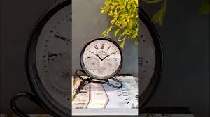 Designed by artist antoine de praiteau, the face of the clock are partially numbered in roman numerals and guidance stripes. Trojan Homeware Antoine De Praiteau 21 Cm Moving Gear Table Clock Youtube