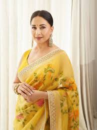 Madhuri Dixit Nenes yellow Anita Dongre sari was handwoven in Varanasi |  Vogue India