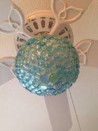 For instance, you will need to decide whether you would like to attach a fixture that has one, two, or three light bulb sockets.5 x install light bulbs, glass shades, and pull chains, following the directions provided by the manufacturer. Turquoise Aqua Ceiling Fan Light Globe After Diy Makeover With Aqua Glass Pebbles From The Dollar T Ceiling Fan Makeover Diy Ceiling Ceiling Fan Light Globes