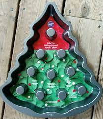 If it comes out clean pull the cake out of the oven. Wilton Industries 2105 0881 Christmas Tree Fluted Non Stick Cake Pan New Tree Cakes Christmas Tree Cake Cake Pans