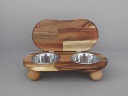 A pet feeding system is disclosed that includes a dish configured to regulate intake of food by a pet, such as a cat. Pet Bowl Stand With Lid Cover Up Ii S Elevated Dog Bowl Holder For Small Pets Elevated Cat Dish Raised Pet Dishes Cat Bowl Holder In 2021 Dog Bowls Pet Bowl