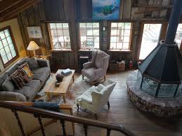 A shed dormer sheds light and creates space to the loft on the upper floor and a carport on the side provides cover for up to two cars. The Main Ranch House Lobitos Creek Ranch