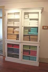 Learn how to store a weighted blanket the right way. I Need This In My House I Have No Storage For Towels Or Sheets Or Blankets Jen White Storage Cabinets Linen Storage Massage Room