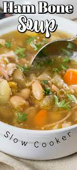 Ham Bone Soup Slow Cooker Is Slowly Cooked With Garlic Potatoes Carrots Celery Corn And Beans To Giv Slow Cooker Soup Ham Bone Soup Recipes Ham Bone Soup