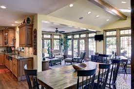 Grey walls, french doors, salvaged rustic wood dining table, white or grey kitchen island, white marble countertops, marble subway tiled backsplash. Home Addition In Arlington Heights Home Additions Room Additions Home Addition