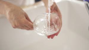 Even though some wineglasses are dubbed dishwasher safe, i know firsthand that some really awesome wine lovers have tempted. Woman Washing Wine Glass Under Stock Footage Video 100 Royalty Free 10097924 Shutterstock