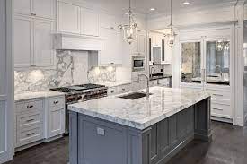 In a kitchen full of deep, dark colors, a marble countertop is a surefire way to add a dramatic pop of white that will also keep your kitchen feeling bright and cozy. Welcome To Smileylymie Com White Kitchen Design White Marble Kitchen Marble Kitchen Island