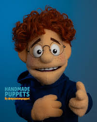 Meet the newest little superstar from the workshop at @mycustompuppet. This  cutie started as an idea and became a full personality with curly red hair,  glasses, braces and all the charm in