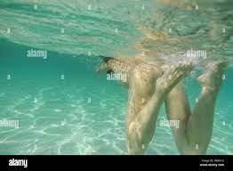mujer desnuda buceando, Cala Marmols, Ses Salines,mallorca, islas baleares,  spain, europa Stock Photo 