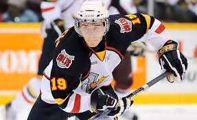 Nikolaj ehlers (27) helps shield jake evans from further injury as he lies motionless on the ice. The Prospect Report Mark Scheifele The Hockey Writers