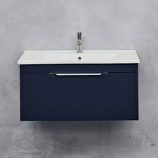 The service blue uniform is worn with a blue plastic name tag and badges. Blue Vanity Units Blue Bathroom Basin Units Drench