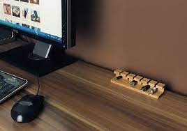 These compartments are similar to trays or raceways that attach underneath the desk to guide the cables and hide them. Simple Cord Management Solutions That Can Make Life Easier