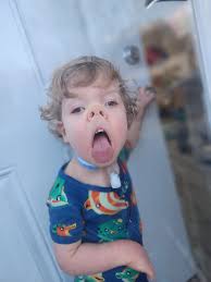 Cecil was making faces through the glass door earlier. I hope these  pictures bring everyone joy!